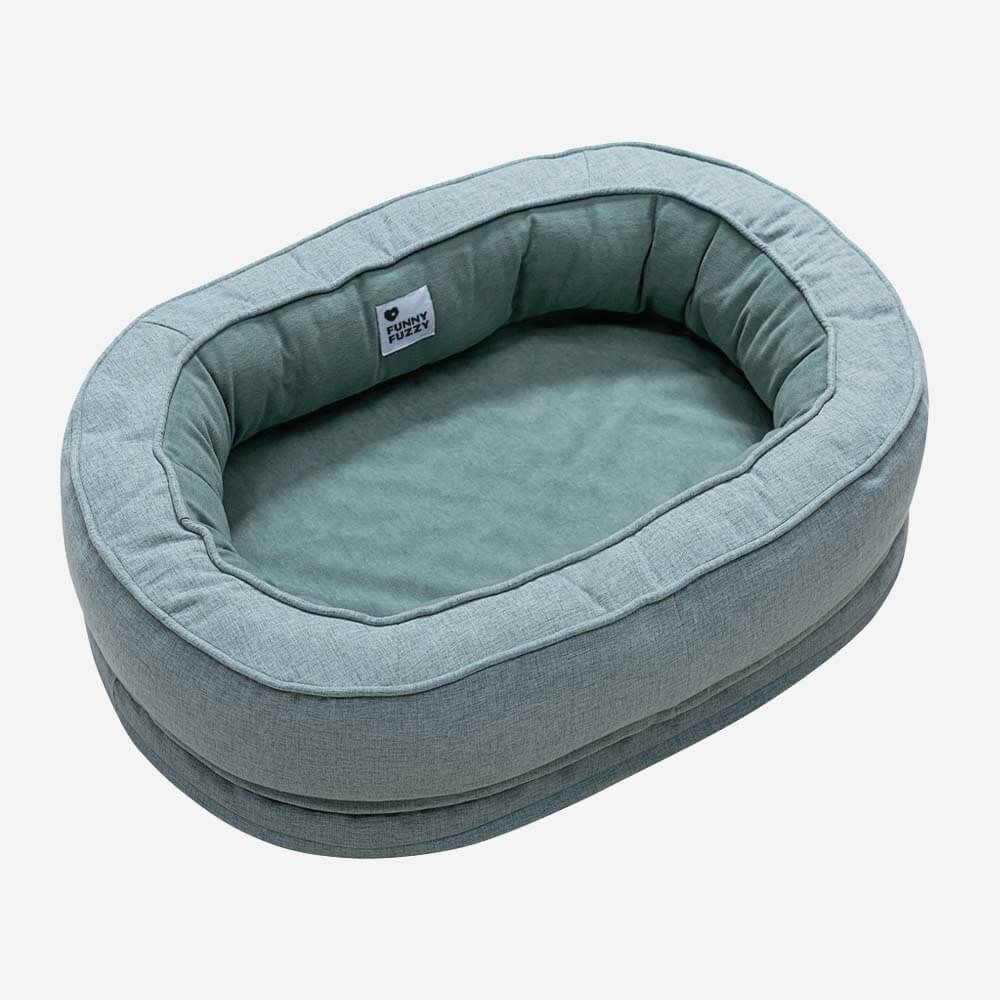 Stilvolles orthopädisches Donut Hundebett, bietet optimalen Schlafkomfort für Hunde.