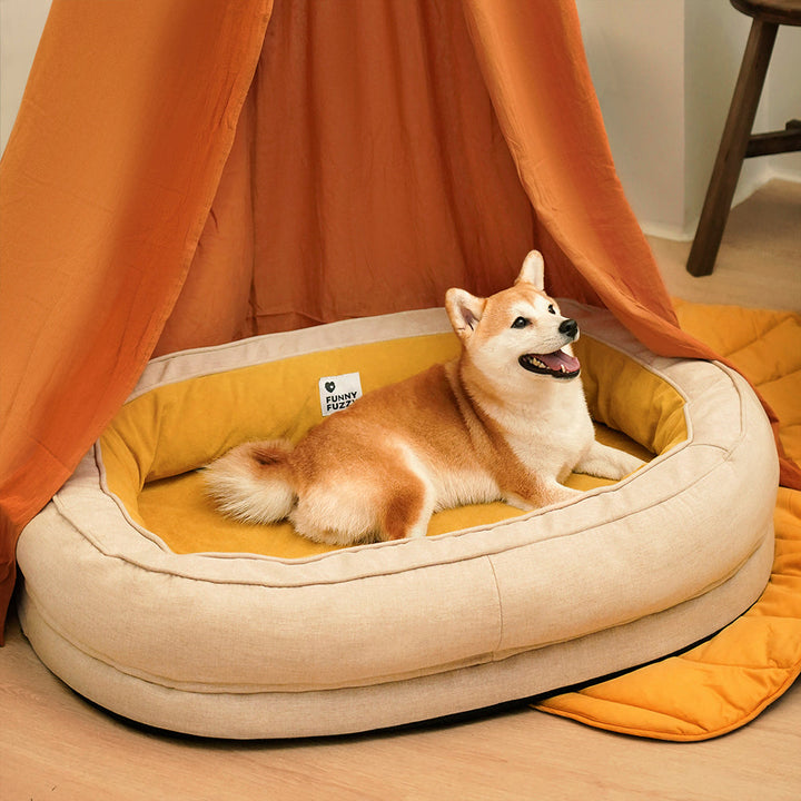Orthopädisches Donut Hundebett in Grau, waschbar & für optimalen Schlafkomfort.