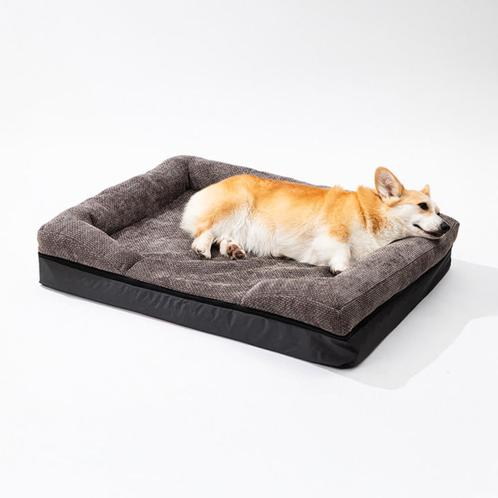 Stilvolles orthopädisches Eckbett für Hunde & Katzen. Waschbar, fügt sich elegant in jedes Zuhause ein.
