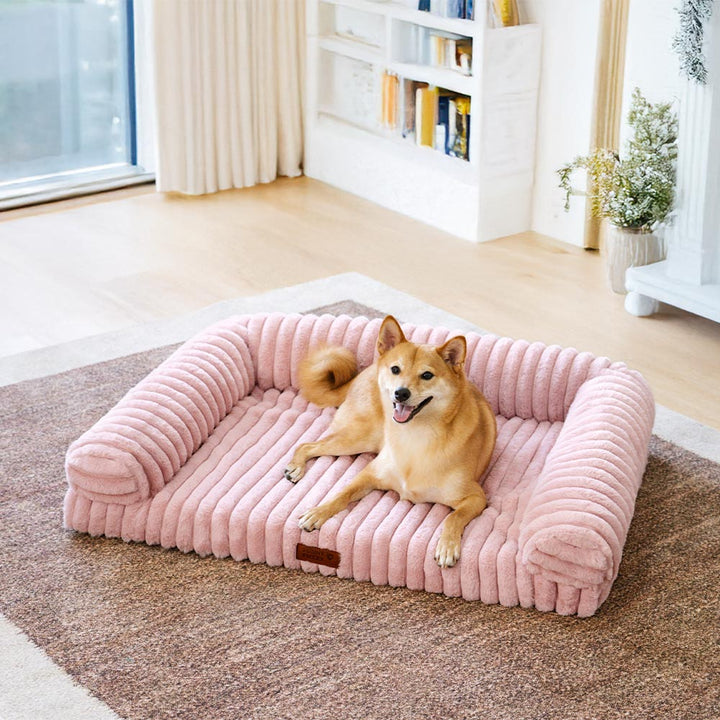 Hochwertiges orthopädisches Hundebett, flauschig & formstabil, für gesunden Schlaf und Gelenkentlastung.