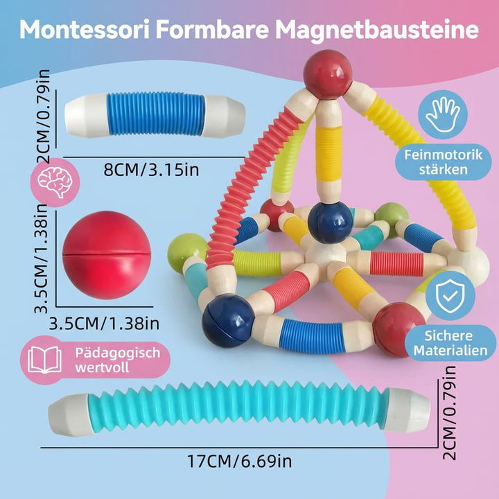 Detailaufnahme: Kind spielt mit Montessori Magnetbausteinen, formt geometrische Figuren.