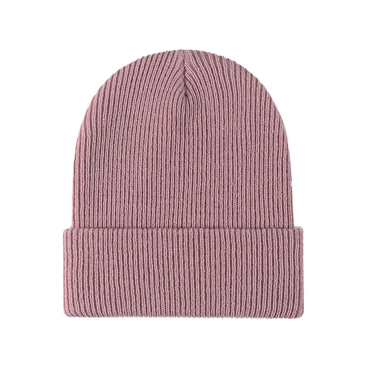 Weiche Unisex Wintermütze Beanie, elegant gefaltet als Geschenkidee. Eine kuschelige Kopfbedeckung für Wintertage.