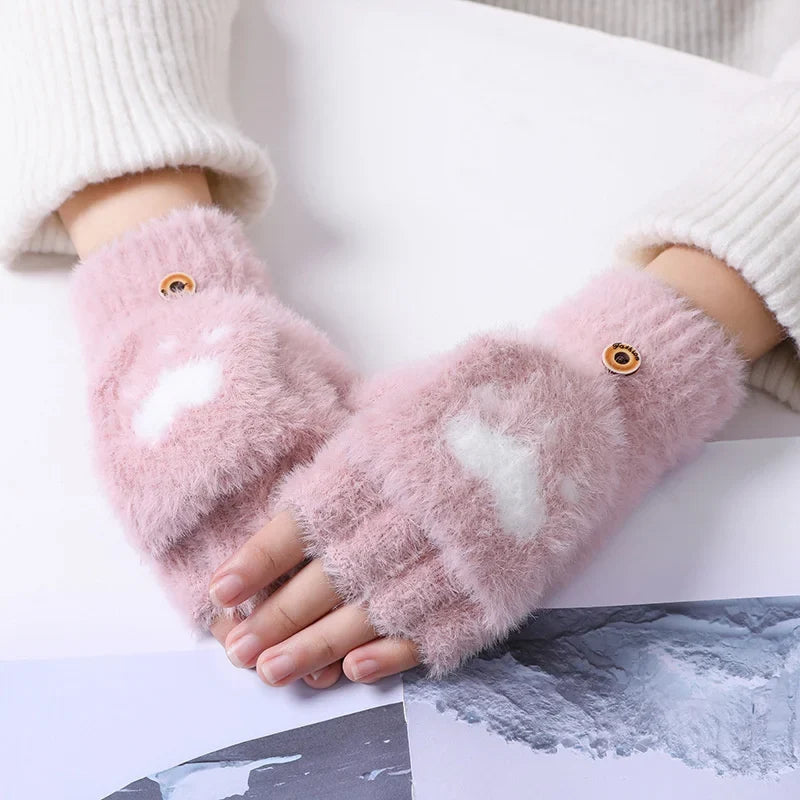 Praktische Damen Fäustlinge für den Winter, faltbar. Bieten hervorragenden Kälteschutz.