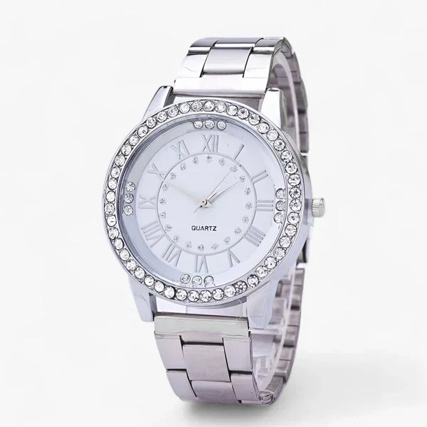 Glänzende Schmuckuhr für Damen mit Diamanten-Zifferblatt & poliertem Stahlarmband. Zeigt Eleganz & Luxus.