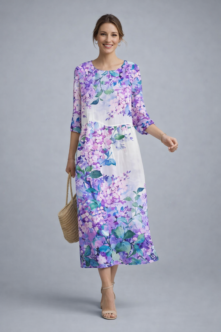 Leichtes, atmungsaktives Damen Midikleid mit Blumenmuster, ideal für heiße Sommertage.