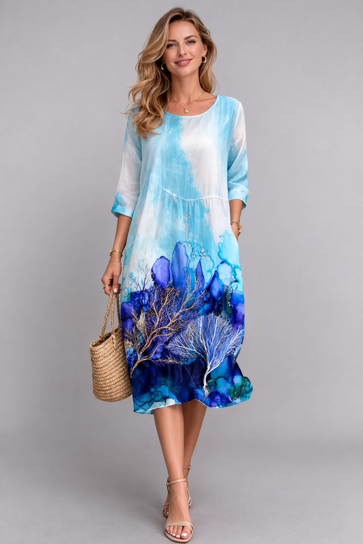 Stilvolles Damen Blumen Midikleid, luftig geschnitten, ideal für warme Sommertage.