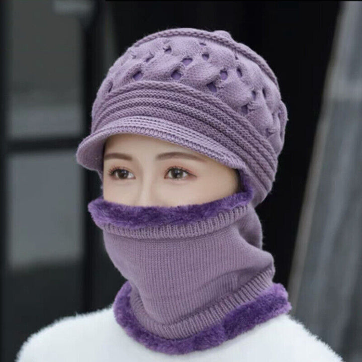 Hochwertiges Winterset mit warmer Beanie-Mütze & weichem Schal. Perfekte Wintermode für stilvolle Auftritte.