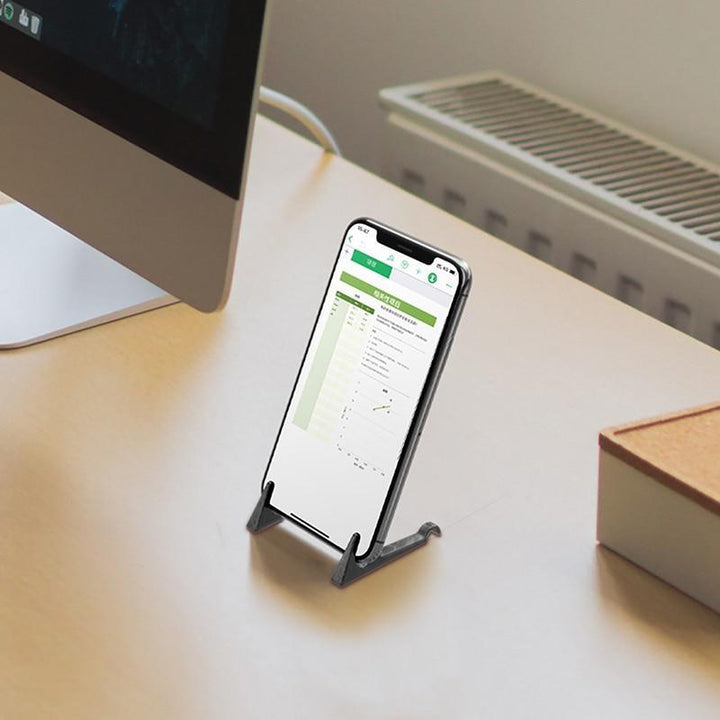 Universal Retro Magnet-Handyhalter für Smartphone & Tablet. Tragbare Kfz- und Schreibtisch-Halterung aus Zinklegierung.