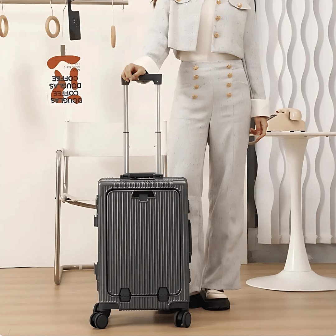 Moderner Handgepäckkoffer mit integriertem Laptopfach, perfekt für Geschäftsreisen & digitale Nomaden.
