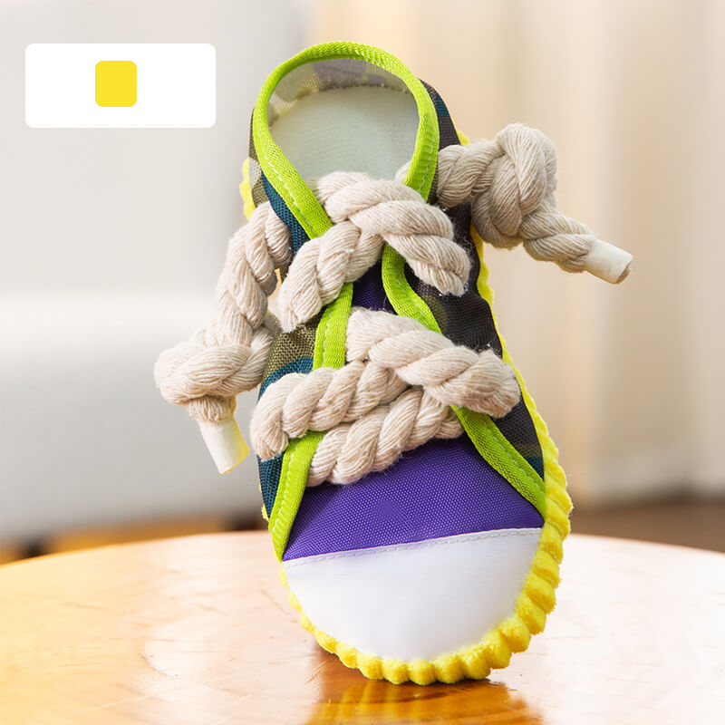 Vielseitiges Kauspielzeug in Schuhform für Hunde, hilft bei Stressabbau & fördert gesunde Kaubedürfnisse.