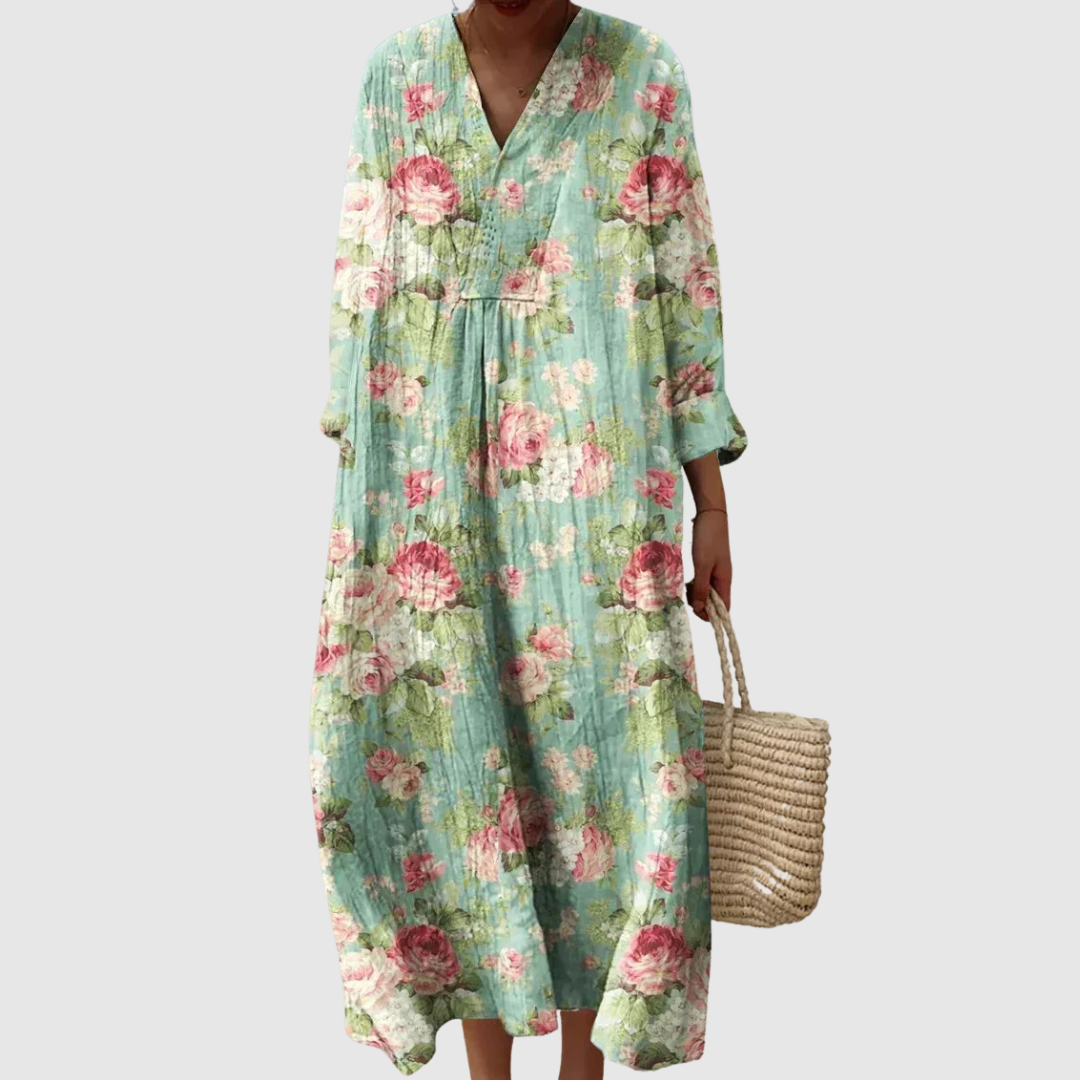 Romantisches Damen Blütenkleid Vera mit elegantem V-Ausschnitt, langen Ärmeln und sommerlichem Blumendruck. Luftiges Midikleid.