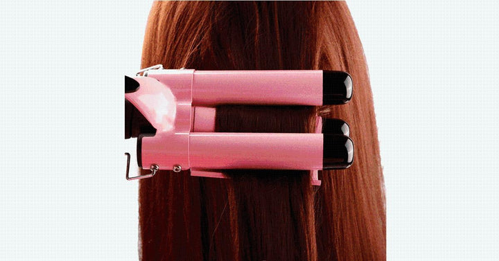 Damen Lockenstab (rosa) mit LCD-Display. Zaubern Sie mühelos moderne Beach Waves oder elegante Locken für jeden Anlass.
