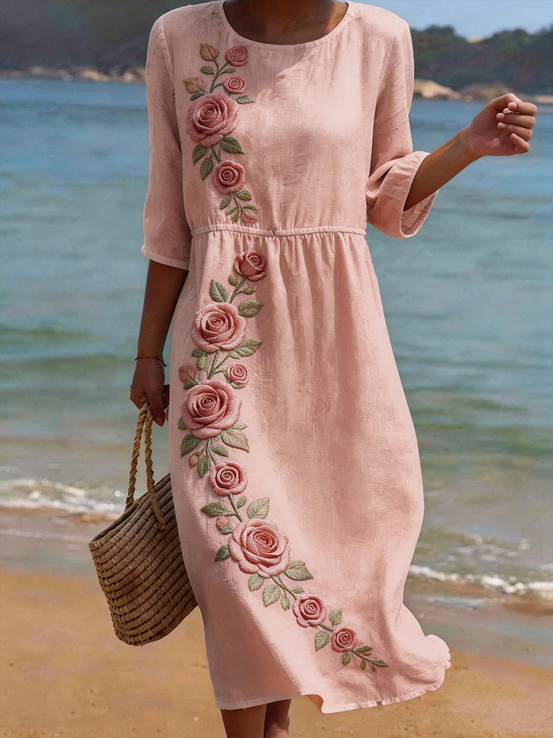 Rosa Damen Midikleid mit Blumenmuster und halblangen Ärmeln. Lässiges Sommerkleid für Freizeit & Alltag.