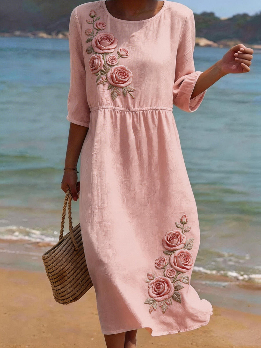 Rosa Damen Midikleid mit elegantem Blumenmuster und halben Ärmeln. Perfektes lässiges Sommerkleid für Komfort.