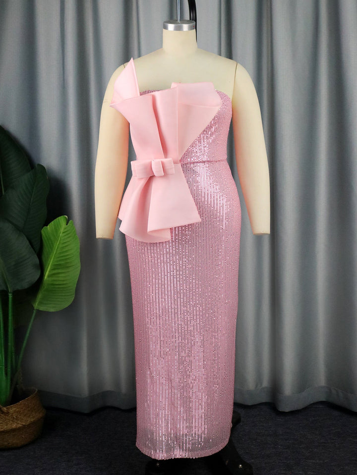 Rosa Damen Abendkleid, glitzernd, asymmetrisch geschnitten mit einer eleganten Schleife an der Schulter, festlich.