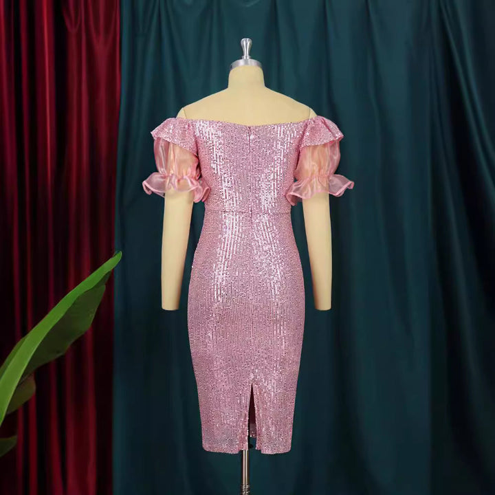 Festliches Damen Cocktailkleid, glitzernd in Rosa, schulterfreies Design mit modischen Puffärmeln. Absolut elegant.