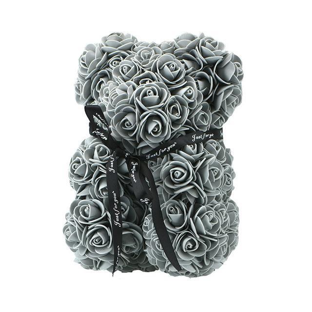 Plüschiger Rosen-Teddybär, handgefertigt mit rosa Blüten; charmantes Deko-Element und Geschenk.