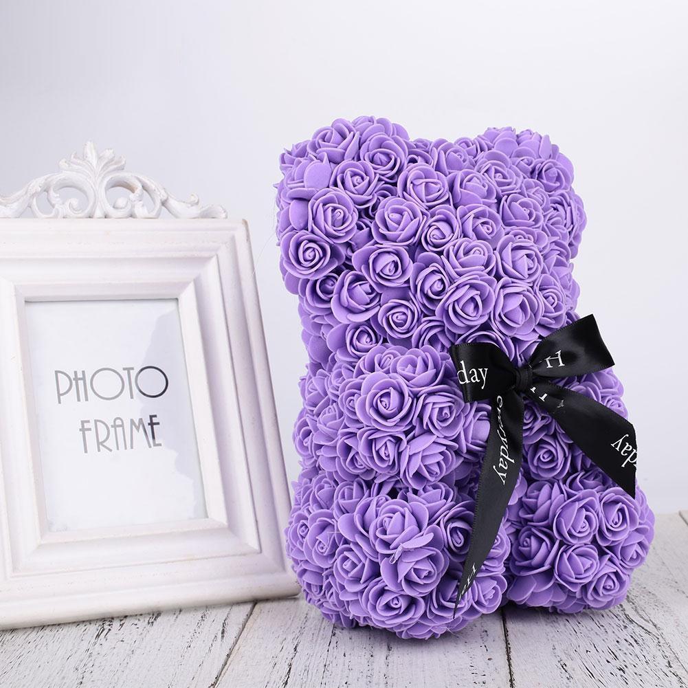 Romantischer Rosenbär, liebevoll mit rosa Kunstrosen verziert; ideales Geschenk für Freundin oder Liebste.