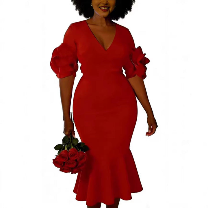 Modisches rotes Partykleid mit schmalem Schnitt und auffälligen Rüschenschultern; perfekt für besondere Abende.