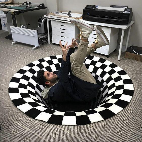 Runder Vortex Illusion Teppich in Schwarz-Weiß, erzeugt eine faszinierende 3D optische Täuschung für Ihr Wohnzimmer.