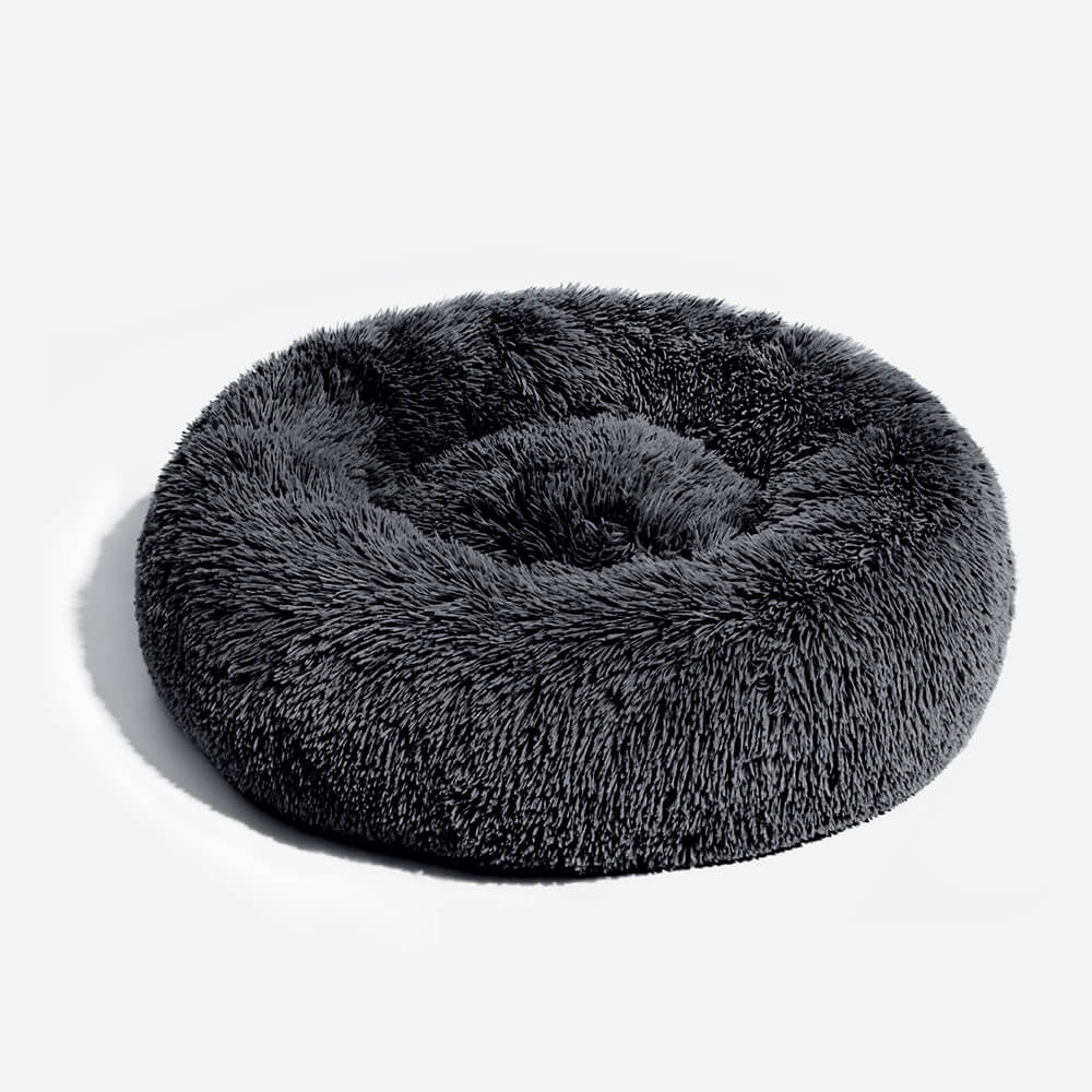 Beruhigendes, rundes Hundebett: Weiches Flausch-Design, perfekt für ängstliche Hunde und tiefen Schlaf.