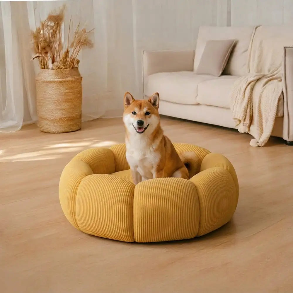 Rundes, weiches Hundebett mit Nackenstütze; waschbar, orthopädisch & gemütlich für erholsamen Schlaf.