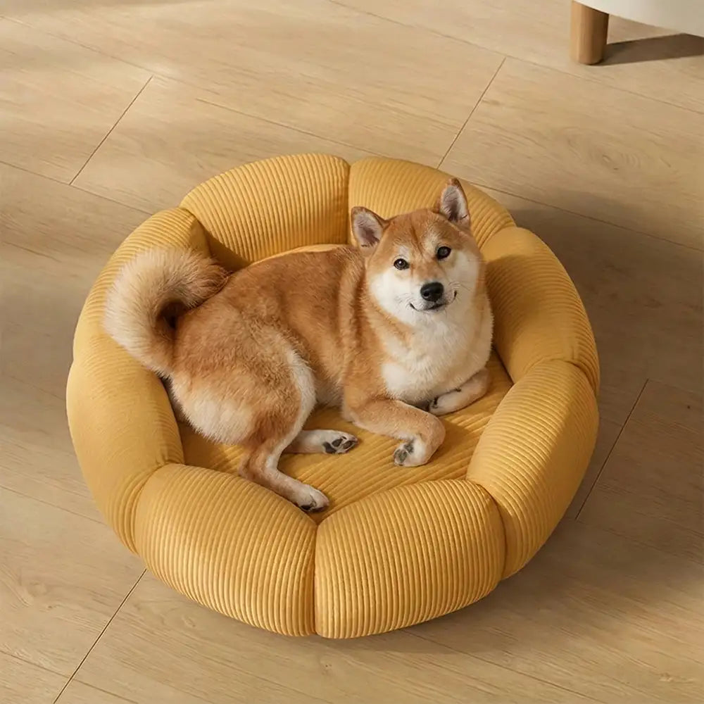Bequemes Haustierbett rund mit erhöhter Nackenstütze, ideal für Hunde & Katzen; orthopädischer Schlafplatz.