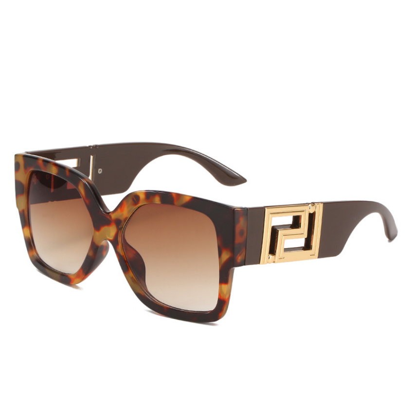 Modische Oversize Sonnenbrille, quadratisch, mit eleganten goldenen Details & UV-Schutz. Für Damen & Herren.