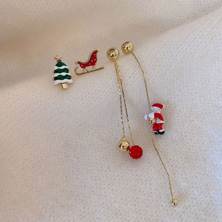 Elegante, lange Quastenohrringe für Damen mit festlichen Weihnachtsmotiven, ein stilvolles Winter-Accessoire.