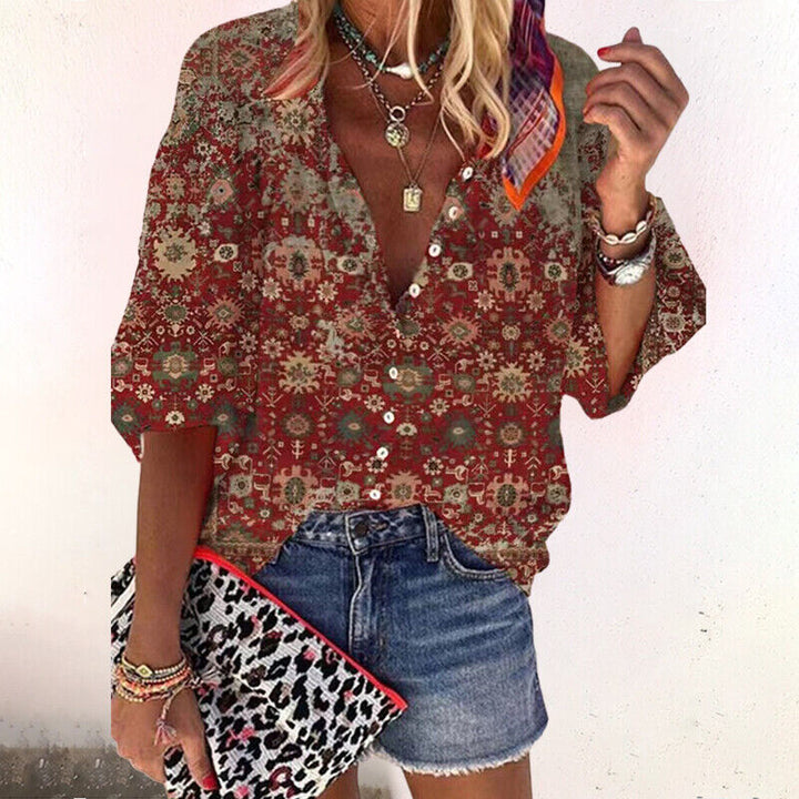 Modische Damen Boho Bluse mit Blumenprint und weiten Ärmeln. Feminine, bequeme Sommerbluse für Freizeit.