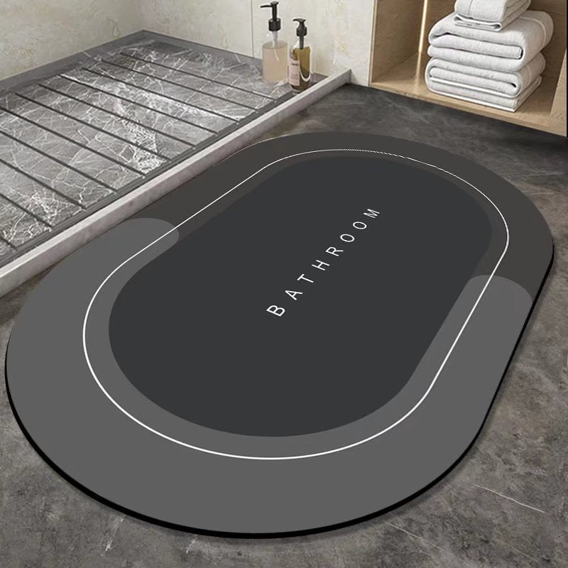 Schnelltrocknende, hygienische Badezimmermatte in Grau, die Feuchtigkeit absorbiert und Rutschschutz bietet.