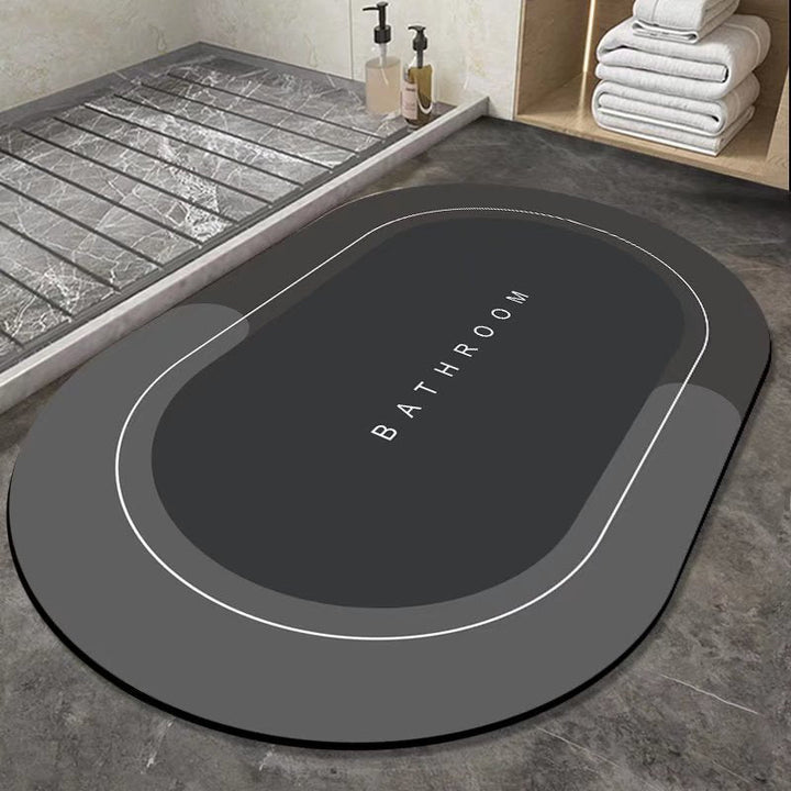 Schnelltrocknende, hygienische Badezimmermatte in Grau, die Feuchtigkeit absorbiert und Rutschschutz bietet.