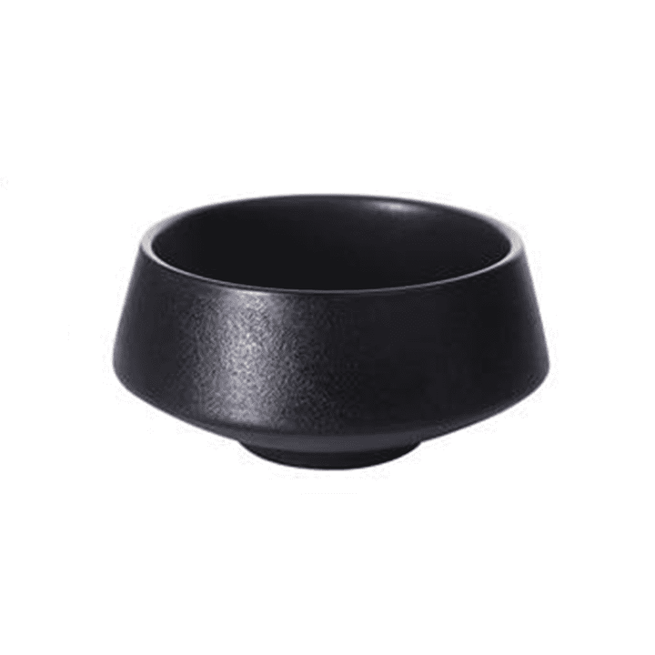 Elegante schwarze Porzellan-Servierschale, modernes Küchengeschirr. Perfekt für Stil und Funktion.