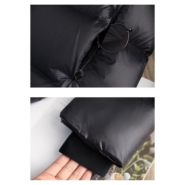 Schwarze Damen-Winterjacke, elegant und warm, wasserdicht für stilvollen Kälteschutz.