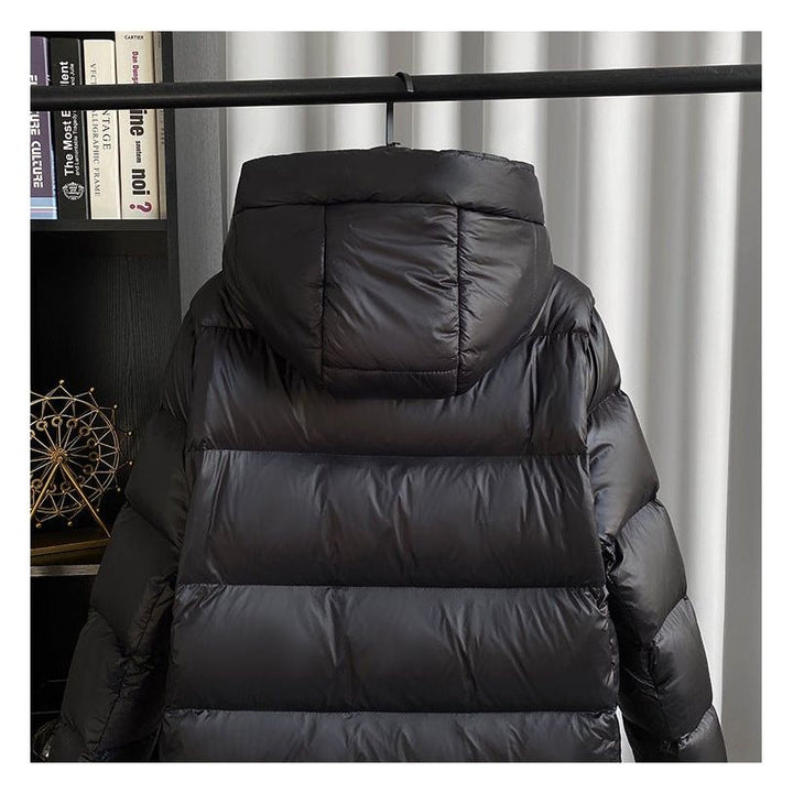 Elegante schwarze Winterjacke für Damen, wasserdicht & warm, ideal für Outdoor-Aktivitäten.