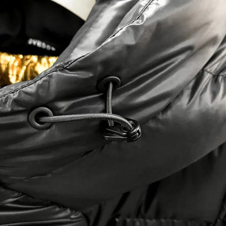 Damen-Winterjacke schwarz, wasserdicht & atmungsaktiv, bietet optimalen Kälteschutz.
