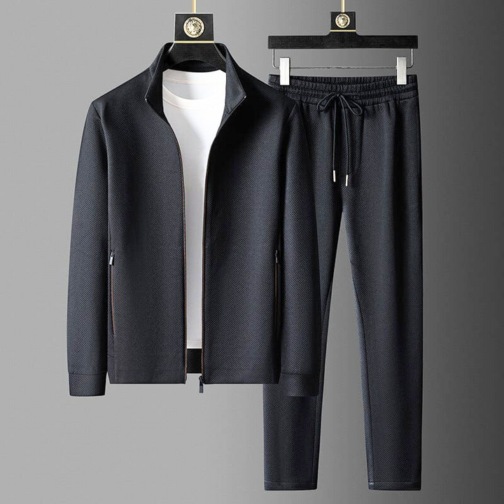Schwarzer Premium Herren Trainingsanzug für Sport & Freizeit. Stilvoller, ganzjähriger Komfort-Sportanzug für Männer.