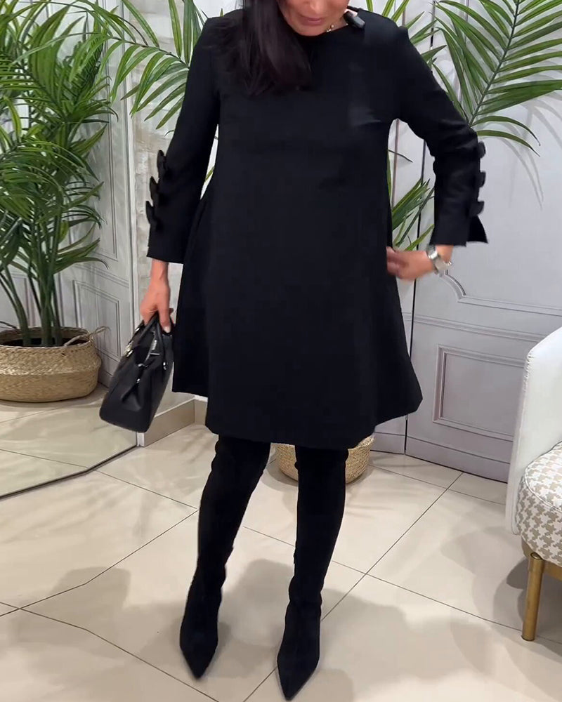 Schickes schwarzes Damen-Businesskleid "Nora" mit langen Ärmeln. Knielang, elegant und ideal für festliche Anlässe.