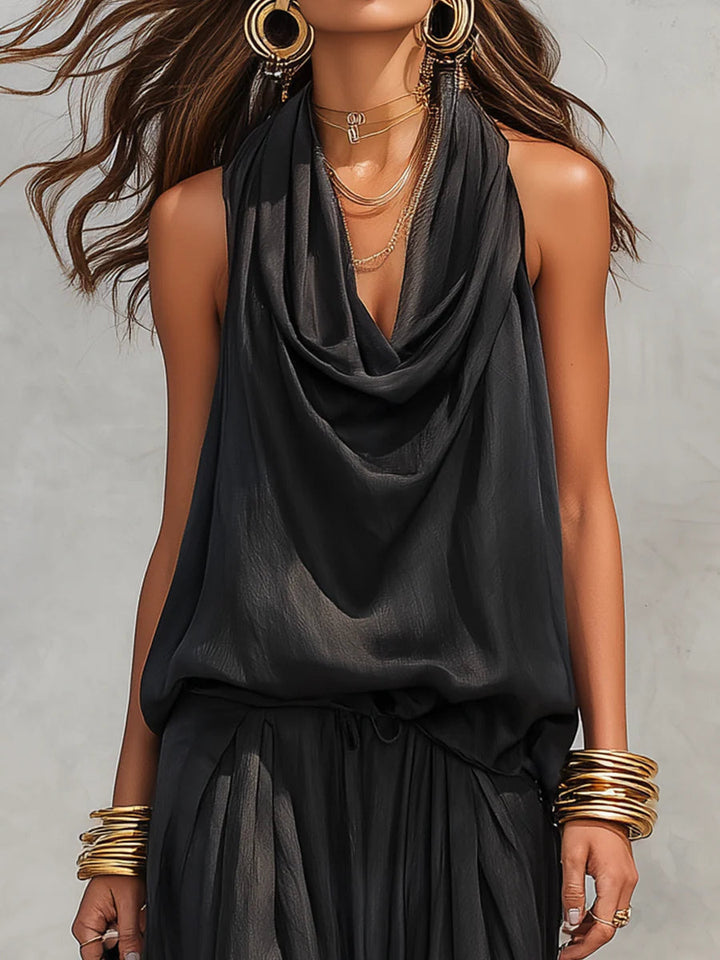 Damen Zweiteiler: Schwarzes elegantes Set mit Neckholder-Top und weiter Hose für Frühling/Sommer. Vielseitiger Look.