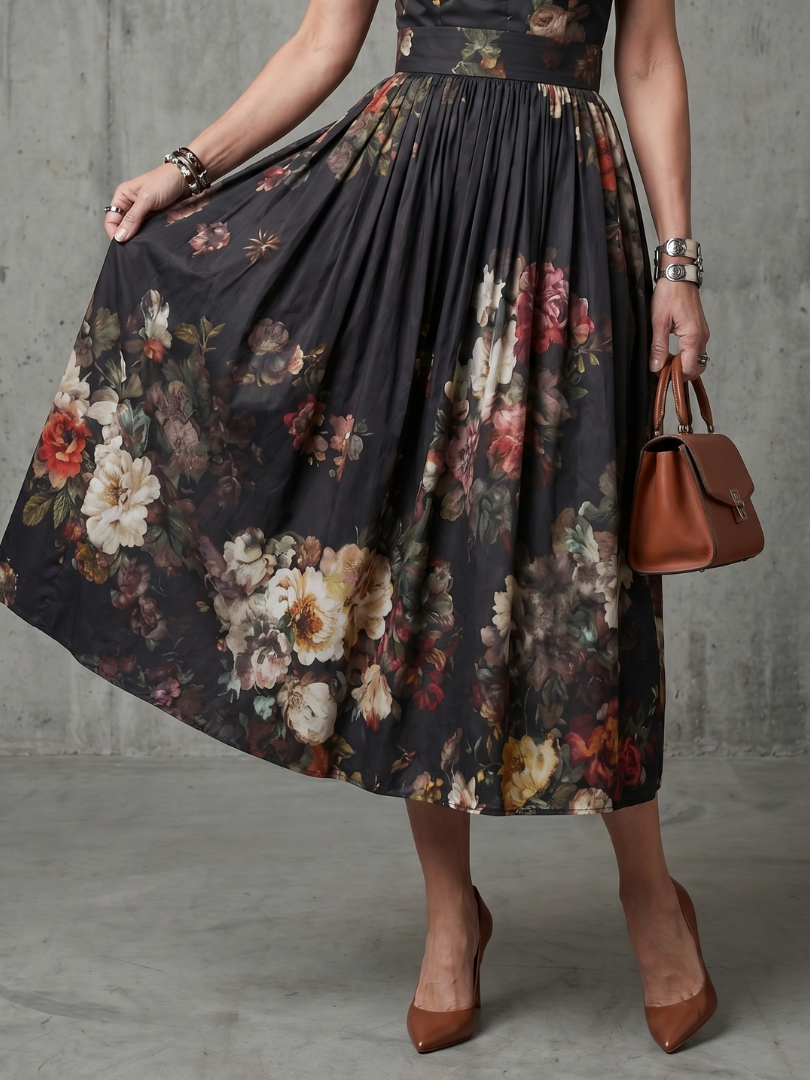 Modisches schwarzes Damen Midikleid ärmellos mit floralem Muster & elegantem Schlüsselloch. Ein Must-have für Damenmode.
