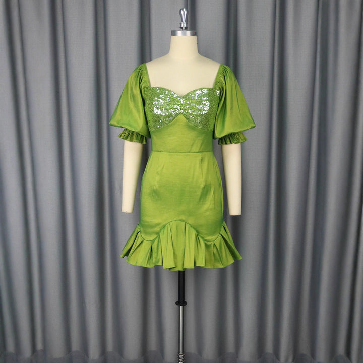 Glamouröses senfgelbes Damen Partykleid mit schimmerndem Glitzer-Bustier & auffälligen voluminösen Ärmeln.