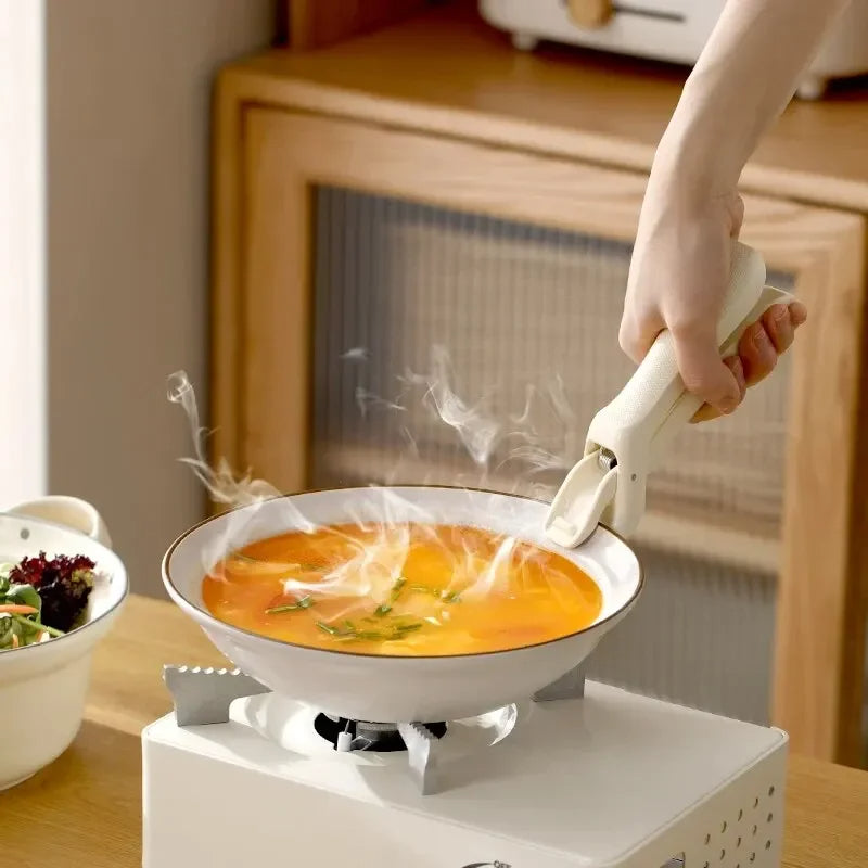 Praktischer Anti-Hitze Silikon-Griff für Töpfe, Schalen & mehr. Grüner, sicherer Küchenhelfer, ideal als Topfgriff.