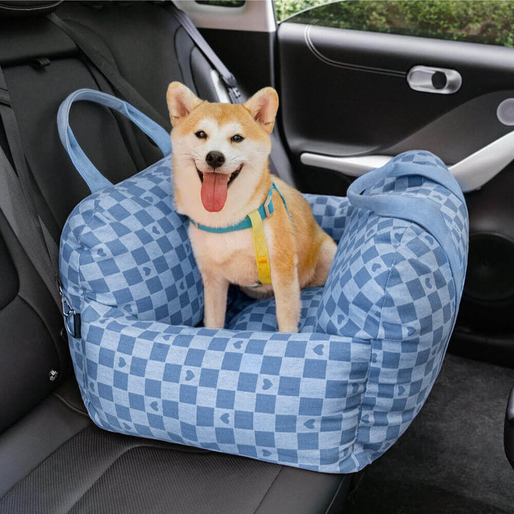 Hundeautositz: ein gemütliches Hundebett auf Rädern.