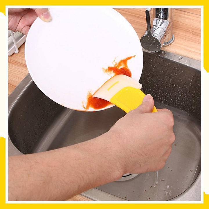 Umweltfreundlicher Silikon-Schaber zum effektiven Putzen und Entfernen von Flecken in der Küche mit Spülmittel.