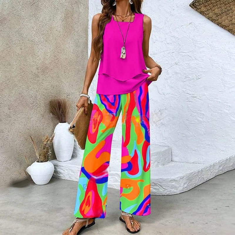 Genieße den Sommer im Damen Zweiteiler. Ärmelloses Top & weite Hose mit Blätterprint. Ideal für Strand & Urlaub.