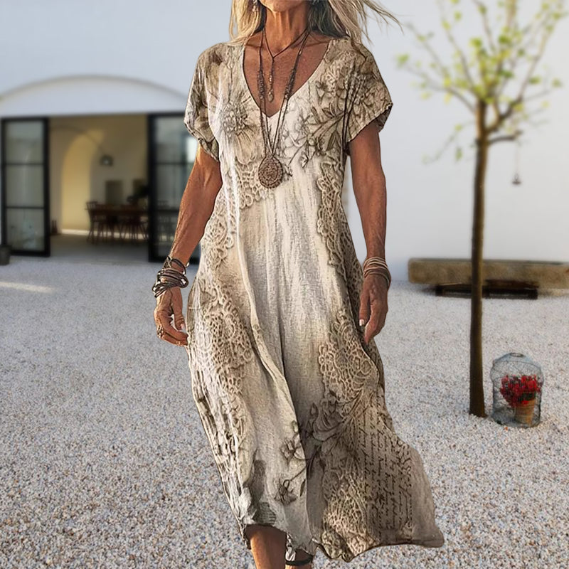 Stylisches Damen Printkleid mit V-Ausschnitt, bodenlang und ideal für sommerliche Anlässe.