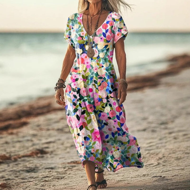 Locker fallendes Damen Sommerkleid mit V-Ausschnitt und sommerlichem Print, ideal für jede Figur.