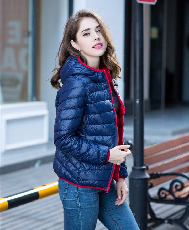 Windabweisende Damen Winterjacke, wendbar & stilvoll, für kalte Tage.