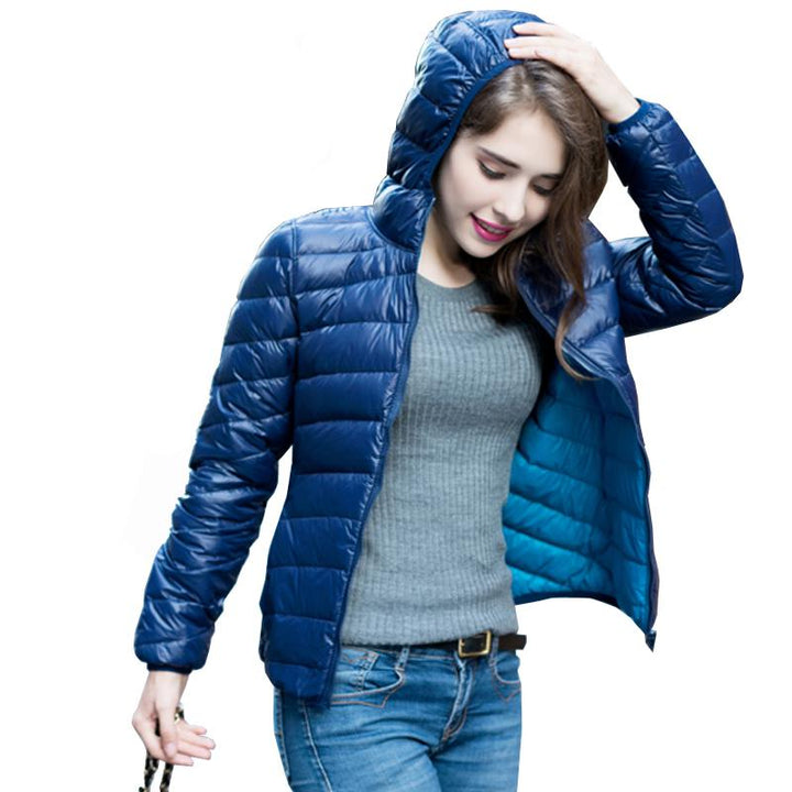 Bequeme wendbare Daunenjacke für Damen, warm & windabweisend.