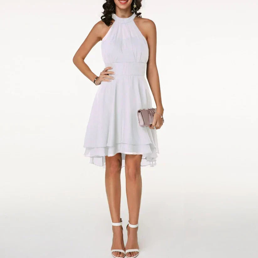 Fließendes Damen Rüschenkleid in elegantem Design. Ein vielseitiges Freizeit- und Partykleid.
